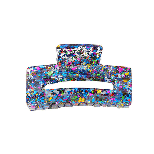 Blå hårklämma med glittereffekt