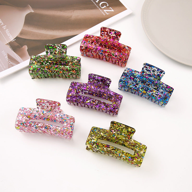 Set med hårklämmor i olika färger med glitter