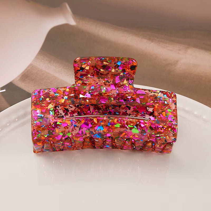 Hårklämma med glitter i röd färg