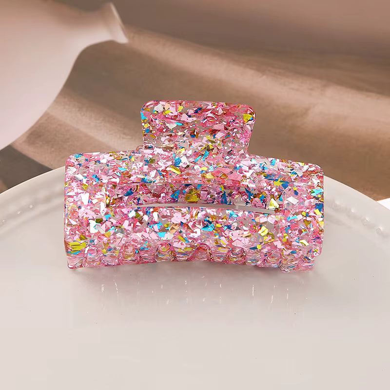 Rosa glitterhårklämma i modern design