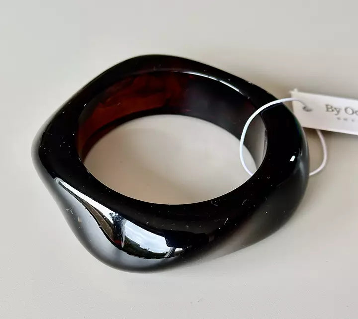 Färgglada plastarmband