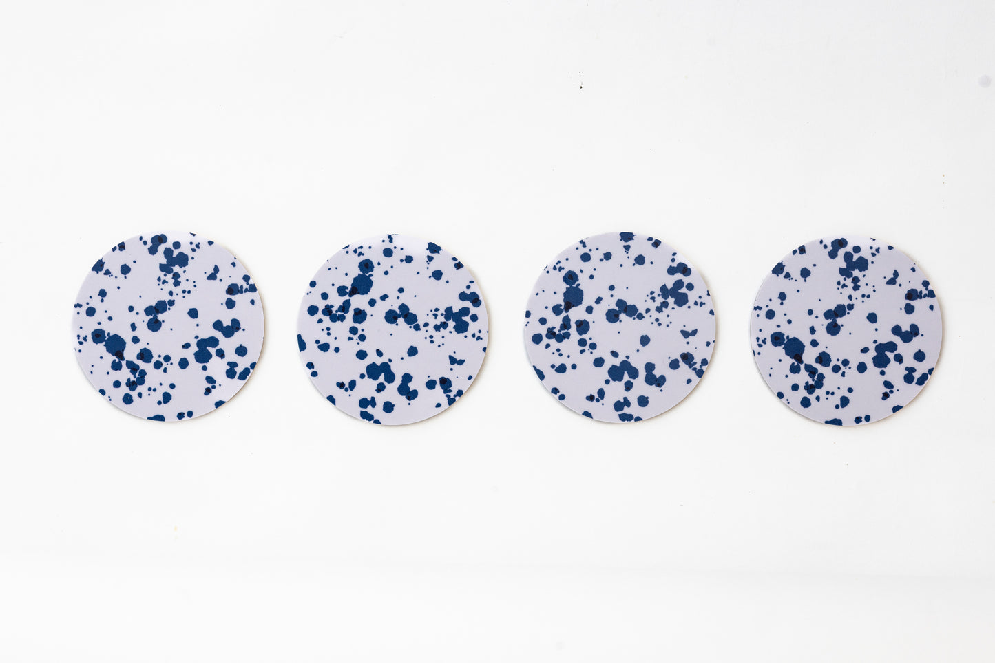 Glasunderlägg – Indigo Splash (4-pack)