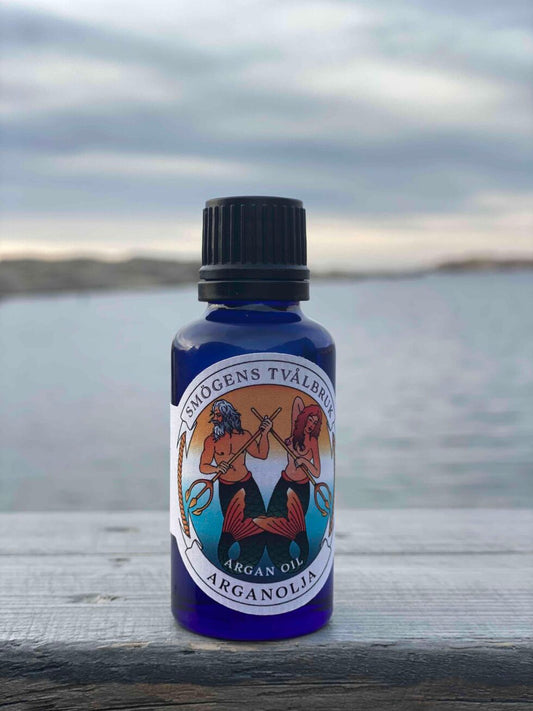 Flaska med ren arganolja från Smögens Tvålbruk, 30 ml, för vård av hår och hud.