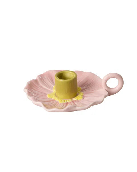Rosa blomformad ljusstake i keramik med gul mitt för kronljus.