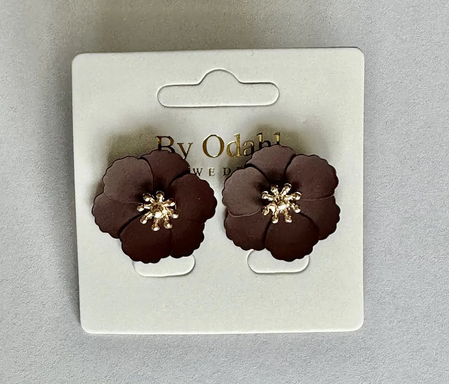 Färgglada blomörhängen